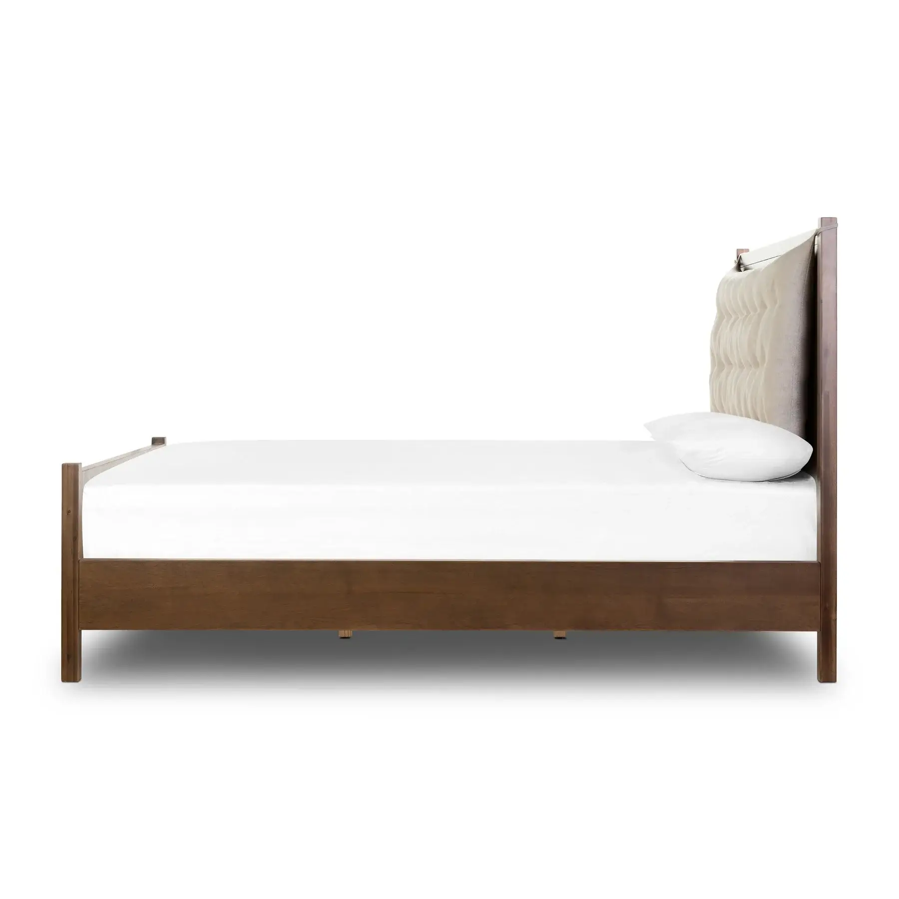 A bright bedroom featuring a LuminaCraft bed frame.